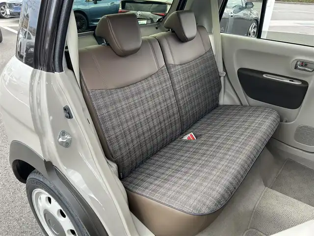 スズキ ラパン ＬＣ X 愛媛県 2022(令4)年 2.4万km フォーンベージュメタリック/アーバンブラウン 2トーン 純正ディスプレイオーディオ/BT/AM・FM/Apple CarPlay・Android Auto/ETC/ステアリングスイッチ/USBポート/D席+N席シートヒーター/アイドリングストップ/レーンキープアシスト/パーキングアシスト/衝突軽減システム/横滑り防止装置/LEDヘッドライト/純正フロアマット/純正アルミホイール