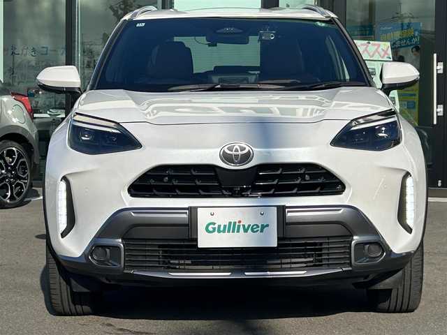 トヨタ ヤリスクロス ハイブリッド Z アドベンチャー 愛媛県 2024(令6)年 0.6万km プラチナホワイトパールマイカ 純正ディスプレイオーディオ（Bluetooth/HDMI)/全周囲カメラ/ETC2.0/茶ハーフレザー/シートヒーター/追従型クルーズコントロール/ブラインドスポットモニター/前後ドライブレコーダー/前後コーナーセンサー/前席ヒートヒーター/ステアリングヒーター/ステアリングリモコン/ドライブ席パワーシート/純正18インチAW/純正フロアマット/衝突被害軽減システム/レーンキープアシスト/横滑り防止装置/盗難防止装置/LEDヘッドライト/オートマチックハイビーム/カーテンエアバック/スペアキー