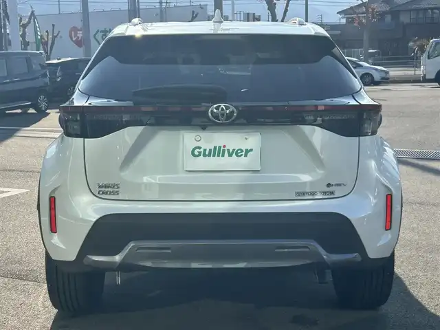 トヨタ ヤリスクロス ハイブリッド Z アドベンチャー 愛媛県 2024(令6)年 0.6万km プラチナホワイトパールマイカ 純正ディスプレイオーディオ（Bluetooth/HDMI)/全周囲カメラ/ETC2.0/茶ハーフレザー/シートヒーター/追従型クルーズコントロール/ブラインドスポットモニター/前後ドライブレコーダー/前後コーナーセンサー/前席ヒートヒーター/ステアリングヒーター/ステアリングリモコン/ドライブ席パワーシート/純正18インチAW/純正フロアマット/衝突被害軽減システム/レーンキープアシスト/横滑り防止装置/盗難防止装置/LEDヘッドライト/オートマチックハイビーム/カーテンエアバック/スペアキー