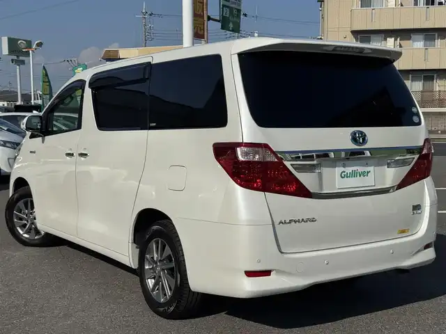トヨタ アルファードハイブリット G 千葉県 2012(平24)年 10.6万km ホワイトパールクリスタルシャイン 社外10型フローティングナビ/フルセグTV/Bluetooth/バックカメラ/両側電動スライドドア/コーナーセンサー/クルーズコントロール/パワーシート/3列シート/HIDヘッドライト/オートライト/純正16インチAW/前後ドラレコ/ETC/保証書・取説