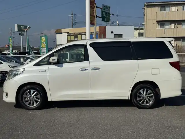 トヨタ アルファードハイブリット G 千葉県 2012(平24)年 10.6万km ホワイトパールクリスタルシャイン 社外10型フローティングナビ/フルセグTV/Bluetooth/バックカメラ/両側電動スライドドア/コーナーセンサー/クルーズコントロール/パワーシート/3列シート/HIDヘッドライト/オートライト/純正16インチAW/前後ドラレコ/ETC/保証書・取説