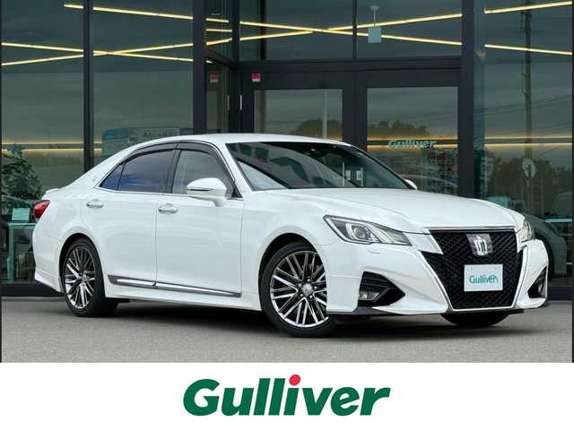 トヨタ クラウン アスリート G 東京都 2016(平28)年 3.4万km ホワイトパールクリスタルシャイン 純正ナビ/（TV/Bluetooth/CD/DVD/USB/SD/VTR/AUX）/純正１８インチアルミホイール/ブラックレザーシート/ブラインドスポットモニター/クルーズコントロール/レーダー探知機/（ZERO　９０９LS）/スマートキー／プッシュスタート/車線逸脱/革巻きステアリング/電動格納ウインカーミラー/パドルシフト/ドアバイザ―/リアプライバシーガラス/ISOFIX/後席サンシェード/横滑り防止装置/新車時保証書/取扱説明書