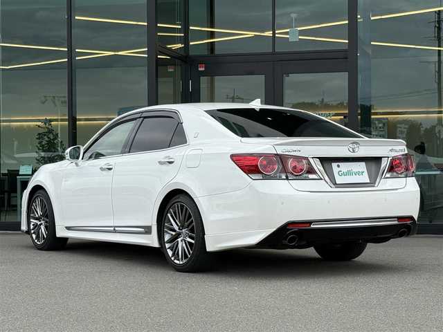 トヨタ クラウン アスリート G 東京都 2016(平28)年 3.4万km ホワイトパールクリスタルシャイン 純正ナビ/（TV/Bluetooth/CD/DVD/USB/SD/VTR/AUX）/純正１８インチアルミホイール/ブラックレザーシート/ブラインドスポットモニター/クルーズコントロール/レーダー探知機/（ZERO　９０９LS）/スマートキー／プッシュスタート/車線逸脱/革巻きステアリング/電動格納ウインカーミラー/パドルシフト/ドアバイザ―/リアプライバシーガラス/ISOFIX/後席サンシェード/横滑り防止装置/新車時保証書/取扱説明書