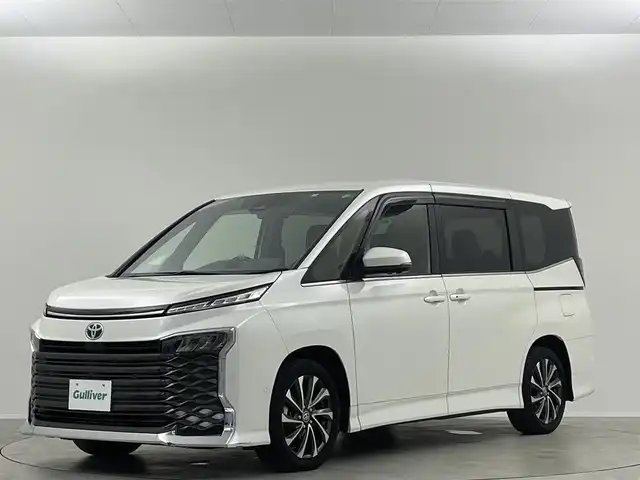 トヨタ ヴォクシー ハイブリッド S－Z 埼玉県 2022(令4)年 2万km ホワイトパールクリスタルシャイン 純正１０．５型ＤＡ　ナビ　フルセグＴＶ　1４型後席モニター　両側電動　アドバンスドパーク　ＥＴＣ２．０　トヨタセーフティセンス　ハーフレザー　温シート　前後ドライブレコーダー　ＬＥＤヘッドライト　禁煙車