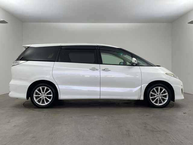 トヨタ エスティマ アエラス Gエディション 兵庫県 2010(平22)年 7.1万km ホワイトパールクリスタルシャイン ・純正ナビ（CD/DVD/TV/SD/AUX)/・両側パワースライドドア/・純正フリップダウンモニター/・コーナーセンサー/・クルーズコントロール/・ビルトインETC/・純正17インチAW/・HIDヘッドライト/・オットマン/・バックカメラ/・オートライト/・フォグランプ/・スマートキー/・プッシュスタート/・スペアキー