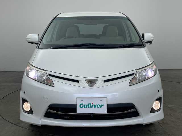 トヨタ エスティマ アエラス Gエディション 兵庫県 2010(平22)年 7.1万km ホワイトパールクリスタルシャイン ・純正ナビ（CD/DVD/TV/SD/AUX)/・両側パワースライドドア/・純正フリップダウンモニター/・コーナーセンサー/・クルーズコントロール/・ビルトインETC/・純正17インチAW/・HIDヘッドライト/・オットマン/・バックカメラ/・オートライト/・フォグランプ/・スマートキー/・プッシュスタート/・スペアキー