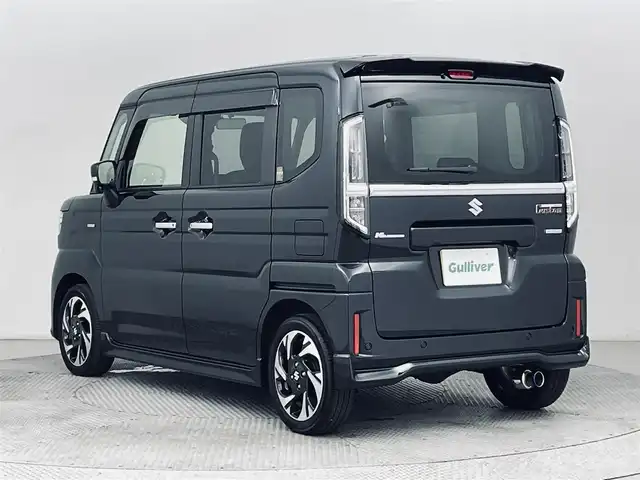 スズキ スペーシア カスタム HYBRID XS ターボ 道央・札幌 2024(令6)年 0.8万km ブルーイッシュブラックパール3 ・4WD/・デュアルセンサーブレーキサポートII/・レーダークルーズコントロール/・両側PSドア/・社外メモリーナビ（SKX-S807）/　CD/DVD/SD/USB/Bt/iPod/フルセグ/・LEDヘッドライト/・オートハイビーム/・オートライト/・HUD/・黒ハーフレザーシート/・シートヒーター（D/N）/・ステアリングヒーター/・前後コーナーセンサー/・パドルシフト/・オートブレーキホールド/・ビルトインETC/・ヘッドライトレベライザー/・スマートキー/・プッシュスタート/・純正15inchアルミ/・保証書（有）/・社外マフラー（柿本改 GT box 06＆S）