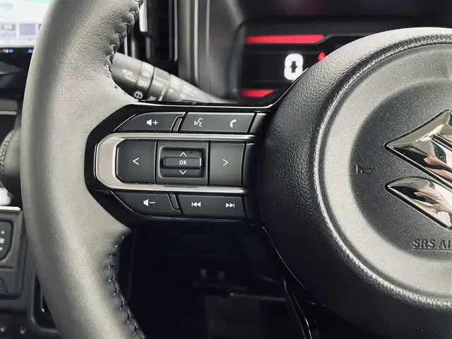 スズキ スペーシア カスタム HYBRID XS ターボ 道央・札幌 2024(令6)年 0.8万km ブルーイッシュブラックパール3 ・4WD/・デュアルセンサーブレーキサポートII/・レーダークルーズコントロール/・両側PSドア/・社外メモリーナビ（SKX-S807）/　CD/DVD/SD/USB/Bt/iPod/フルセグ/・LEDヘッドライト/・オートハイビーム/・オートライト/・HUD/・黒ハーフレザーシート/・シートヒーター（D/N）/・ステアリングヒーター/・前後コーナーセンサー/・パドルシフト/・オートブレーキホールド/・ビルトインETC/・ヘッドライトレベライザー/・スマートキー/・プッシュスタート/・純正15inchアルミ/・保証書（有）/・社外マフラー（柿本改 GT box 06＆S）