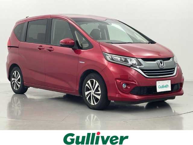 ホンダ フリード ハイブリット G ホンダセンシング 熊本県 2019(平31)年 4.5万km プレミアムクリスタルレッドM ●ギャザーズナビVXM-174VFXi/(CD/DVD/Bluetooth)/●ビルトインETC/●ハーフレザーシート/●バックカメラ/●レ－ダークルーズコントロール/●両側パワースライドドア/●衝突被害軽減システム/●レーンキープアシスト/●前後クリアランスソナー/●横滑り防止/●オートライト/●LEDヘッドライト/●スマートキー/●プッシュスタート/●スペアキー1本/●革巻きステアリング/●ステアリングスイッチ/●純正15インチアルミホイール/●純正フロアマット/●保証書/●取扱説明書