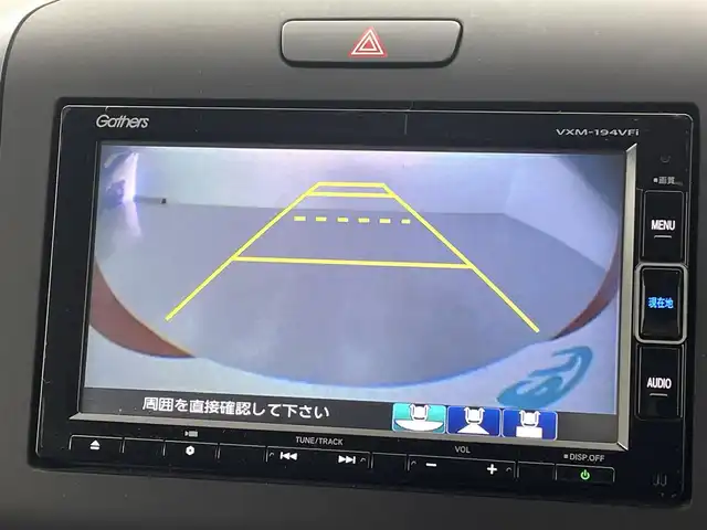 ホンダ フリード ハイブリット G ホンダセンシング 熊本県 2019(平31)年 4.5万km プレミアムクリスタルレッドM ●ギャザーズナビVXM-174VFXi/(CD/DVD/Bluetooth)/●ビルトインETC/●ハーフレザーシート/●バックカメラ/●レ－ダークルーズコントロール/●両側パワースライドドア/●衝突被害軽減システム/●レーンキープアシスト/●前後クリアランスソナー/●横滑り防止/●オートライト/●LEDヘッドライト/●スマートキー/●プッシュスタート/●スペアキー1本/●革巻きステアリング/●ステアリングスイッチ/●純正15インチアルミホイール/●純正フロアマット/●保証書/●取扱説明書