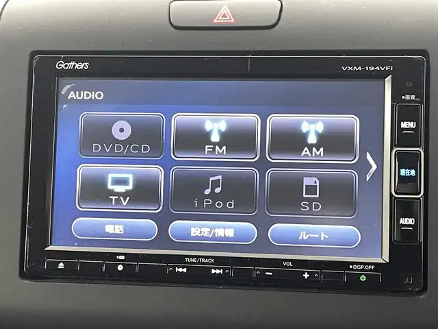 ホンダ フリード ハイブリット G ホンダセンシング 熊本県 2019(平31)年 4.5万km プレミアムクリスタルレッドM ●ギャザーズナビVXM-174VFXi/(CD/DVD/Bluetooth)/●ビルトインETC/●ハーフレザーシート/●バックカメラ/●レ－ダークルーズコントロール/●両側パワースライドドア/●衝突被害軽減システム/●レーンキープアシスト/●前後クリアランスソナー/●横滑り防止/●オートライト/●LEDヘッドライト/●スマートキー/●プッシュスタート/●スペアキー1本/●革巻きステアリング/●ステアリングスイッチ/●純正15インチアルミホイール/●純正フロアマット/●保証書/●取扱説明書