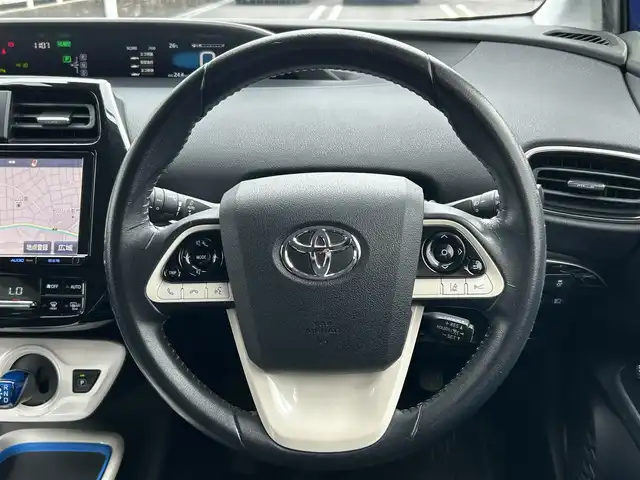 トヨタ プリウス A 愛知県 2016(平28)年 11万km ダークブルーマイカM 純正SDナビ(FM/AM/CD/DVD/BT/HDMI/ワンセグ)/トヨタセーフティーセンスP/　・プリクラッシュセーフティー/　・レーンディーパーチャーアラート/　・ブラインドスポットモニター/　・アドバンスドパーキングシステム/　・レーダークルーズコントロール/クリアランスソナー・コーナーセンサー/バックカメラ/革巻きステアリング/ドライブレコーダー/LEDヘッドライト/フォグランプ/純正AW15インチ/電動格納ミラー/トノカバー/ETC/純正フロアマット/プッシュスタート/スマートキー/ステアリングリモコン/ハンズフリー/ABS/取扱説明書・保証書