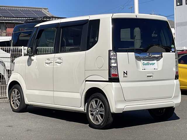 ホンダ Ｎ ＢＯＸ SSパッケージ 愛媛県 2014(平26)年 5.7万km プレミアムホワイトパール ワンオーナー/社外メモリナビ/・フルセグTV/・Bluetooth接続/・CD/DVD再生/・AM/FM/両側パワースライドドア/フリップダウンモニター/前席シートヒーター/前方ドライブレコーダー/オートライト/純正14インチAW/ベンチシート/チップアップシート/スマートキー/スペアキー/保証書