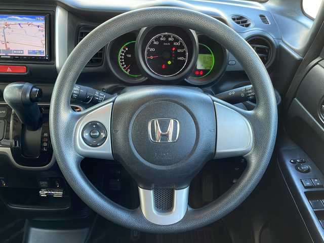 ホンダ Ｎ ＢＯＸ SSパッケージ 愛媛県 2014(平26)年 5.7万km プレミアムホワイトパール ワンオーナー/社外メモリナビ/・フルセグTV/・Bluetooth接続/・CD/DVD再生/・AM/FM/両側パワースライドドア/フリップダウンモニター/前席シートヒーター/前方ドライブレコーダー/オートライト/純正14インチAW/ベンチシート/チップアップシート/スマートキー/スペアキー/保証書