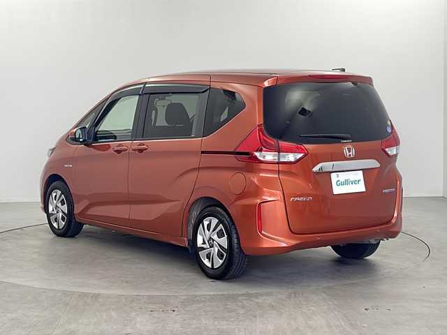 ホンダ フリード ハイブリット G ホンダセンシング 栃木県 2020(令2)年 6.8万km プレミアムクリスタルオレンジM 純正ナビ/・Bluetooth/・CD/DVD/・フルセグテレビ/・SD音楽録音/ホンダセンシング/・衝突軽減ブレーキ/・誤発進抑制機能/・クルーズコントロール/・車線維持支援システム/・路外逸脱抑制機能/・先行車発進お知らせ機能/・標識認識機能/バックカメラ/両側パワースライドドア/シートヒーター/衝突軽減ブレーキ/レーンキープアシスト/クルーズコントロール/前後ドライブレコーダー/ビルトインETC/LEDヘッドライト