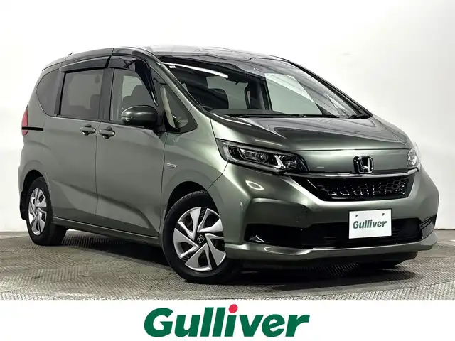 ホンダ フリード ハイブリット G ホンダセンシング 大阪府 2020(令2)年 4.5万km シルバーミストグリーンM 純正9incナビ(フルセグ/DVD再生/Bluetooth) バックカメラ ETC 両側パワースライドドア シートヒーター 衝突軽減 レーダークルコン レーンアシスト 前後ドラレコ オートライト