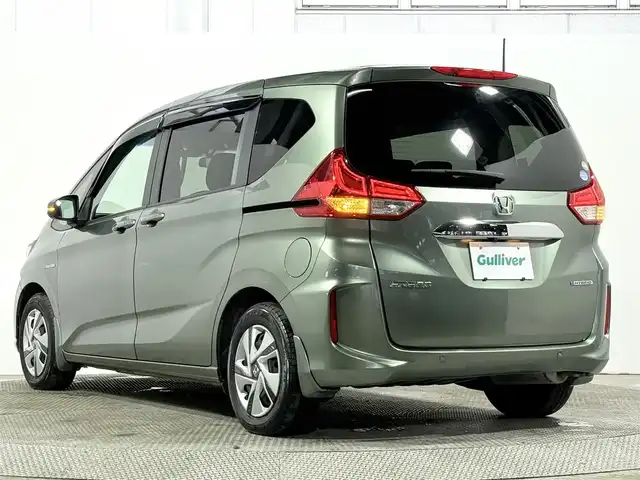 ホンダ フリード ハイブリット G ホンダセンシング 大阪府 2020(令2)年 4.5万km シルバーミストグリーンM 純正9incナビ(フルセグ/DVD再生/Bluetooth) バックカメラ ETC 両側パワースライドドア シートヒーター 衝突軽減 レーダークルコン レーンアシスト 前後ドラレコ オートライト