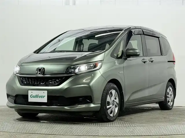 ホンダ フリード ハイブリット G ホンダセンシング 大阪府 2020(令2)年 4.5万km シルバーミストグリーンM 純正9incナビ(フルセグ/DVD再生/Bluetooth) バックカメラ ETC 両側パワースライドドア シートヒーター 衝突軽減 レーダークルコン レーンアシスト 前後ドラレコ オートライト
