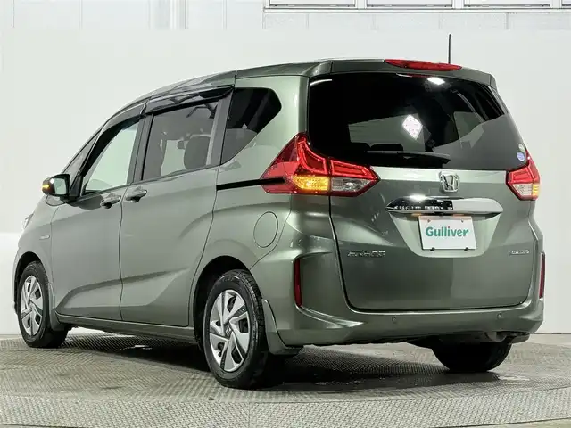 ホンダ フリード ハイブリット G ホンダセンシング 大阪府 2020(令2)年 4.5万km シルバーミストグリーンM 純正9incナビ(フルセグ/DVD再生/Bluetooth) バックカメラ ETC 両側パワースライドドア シートヒーター 衝突軽減 レーダークルコン レーンアシスト 前後ドラレコ オートライト