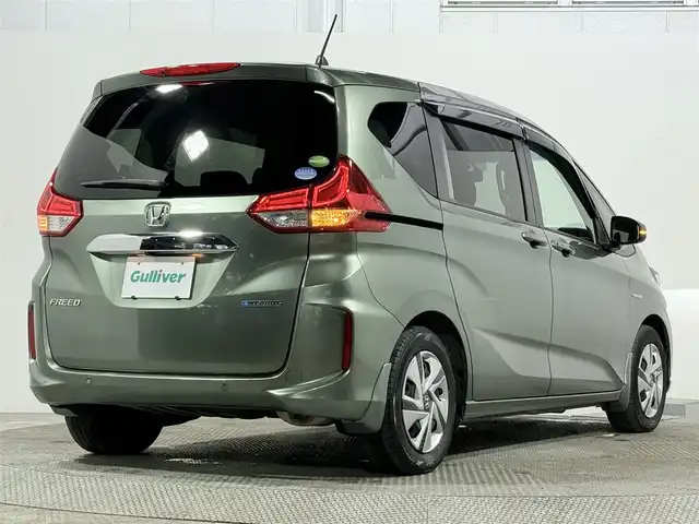 ホンダ フリード ハイブリット G ホンダセンシング 大阪府 2020(令2)年 4.5万km シルバーミストグリーンM 純正9incナビ(フルセグ/DVD再生/Bluetooth) バックカメラ ETC 両側パワースライドドア シートヒーター 衝突軽減 レーダークルコン レーンアシスト 前後ドラレコ オートライト