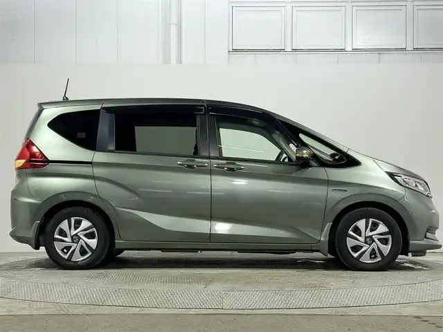 ホンダ フリード ハイブリット G ホンダセンシング 大阪府 2020(令2)年 4.5万km シルバーミストグリーンM 純正9incナビ(フルセグ/DVD再生/Bluetooth) バックカメラ ETC 両側パワースライドドア シートヒーター 衝突軽減 レーダークルコン レーンアシスト 前後ドラレコ オートライト