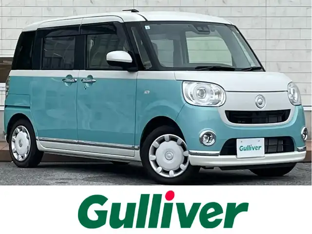 ダイハツ ムーヴ キャンバス G メイクアップ VS SAⅢ 滋賀県 2021(令3)年 1.1万km パールホワイトⅢ/ファインミントメタリック 2トーン 純正8インチメーカーナビ/(AM/FM/CD/DVD/iPod/SD/フルセグTV)/パノラマモニター/コーナーセンサー/シートヒーター/両側パワースライドドア/ETC/ドライブレコーダー/スマートアシスト/オートマチックハイビーム/オートライト/ステアリングスイッチ/横滑り防止装置/アイドリングストップ/プッシュスタート/純正フロアマット/電格ミラー/スマートキー/スペアキー