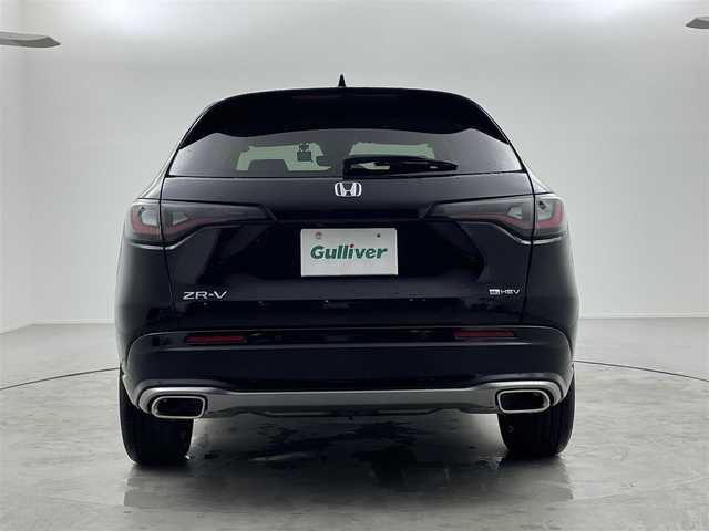 ホンダ ＺＲ－Ｖ ハイブリッド e:HEV Z 福井県 2023(令5)年 1.2万km クリスタルブラックパール ホンダセンシング/・衝突軽減ブレーキ/・車線逸脱警報機能/・クルーズコントロール（追従有）/純正Honda CONNECTディスプレー/【AM/FM/Bluetooth/フルセグTV/USB】/ETC2.0/ワイヤレス充電器/全方位カメラ/本革シート/パワーシート（運転席/助手席）/シートヒーター（運転席/助手席）/BOSEプレミアムサウンドシステム(12スピーカー)/プッシュスタート/スマートキー/スペアキー/オートライト/LEDヘッドライド/ドライブレコーダー