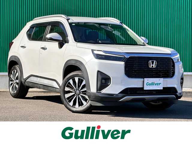 ホンダ ＷＲ－Ｖ Z+ 宮城県 2024(令6)年 0.6万km プラチナホワイトパール ホンダセンシング/・衝突軽減ブレーキ/・誤発進抑制機能/・後方誤発進抑制機能/・近距離衝突軽減ブレーキ/・歩行者事故低減ステアリング/・路外逸脱抑制機能/・アダプティブクルーズコントロール/・車線維持支援システム/・先行車発進お知らせ機能/・標識認識機能/・オートハイビーム/・パーキングセンサーシステム/純正ディスプレイオーディオ/バックカメラ/純正ドライブレコーダー/純正17インチＡＷ/パドルシフト/ハーフレザーシート/革巻きステアリング/ステアリングスイッチ/プッシュスタート/電動格納ミラーウィンカー/横滑り防止装置/ルーフレール/オートライト/LEDヘッドライト/LEDフォグ/スマートキー/ETC