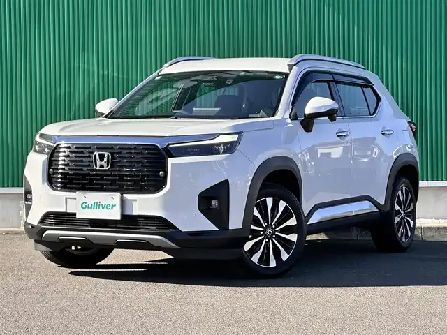 ホンダ ＷＲ－Ｖ Z+ 宮城県 2024(令6)年 0.6万km プラチナホワイトパール ホンダセンシング/・衝突軽減ブレーキ/・誤発進抑制機能/・後方誤発進抑制機能/・近距離衝突軽減ブレーキ/・歩行者事故低減ステアリング/・路外逸脱抑制機能/・アダプティブクルーズコントロール/・車線維持支援システム/・先行車発進お知らせ機能/・標識認識機能/・オートハイビーム/・パーキングセンサーシステム/純正ディスプレイオーディオ/バックカメラ/純正ドライブレコーダー/純正17インチＡＷ/パドルシフト/ハーフレザーシート/革巻きステアリング/ステアリングスイッチ/プッシュスタート/電動格納ミラーウィンカー/横滑り防止装置/ルーフレール/オートライト/LEDヘッドライト/LEDフォグ/スマートキー/ETC