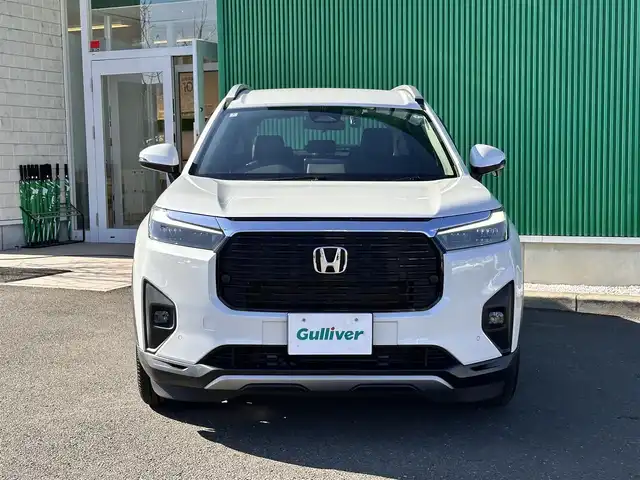 ホンダ ＷＲ－Ｖ Z+ 宮城県 2024(令6)年 0.6万km プラチナホワイトパール ホンダセンシング/・衝突軽減ブレーキ/・誤発進抑制機能/・後方誤発進抑制機能/・近距離衝突軽減ブレーキ/・歩行者事故低減ステアリング/・路外逸脱抑制機能/・アダプティブクルーズコントロール/・車線維持支援システム/・先行車発進お知らせ機能/・標識認識機能/・オートハイビーム/・パーキングセンサーシステム/純正ディスプレイオーディオ/バックカメラ/純正ドライブレコーダー/純正17インチＡＷ/パドルシフト/ハーフレザーシート/革巻きステアリング/ステアリングスイッチ/プッシュスタート/電動格納ミラーウィンカー/横滑り防止装置/ルーフレール/オートライト/LEDヘッドライト/LEDフォグ/スマートキー/ETC