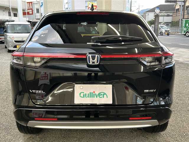 ホンダ ヴェゼル ハイブリッド e:HEV Z 兵庫県 2021(令3)年 4.4万km クリスタルブラックパール ワンオーナー/HondSENSING/Honda CONNECTディスプレー＋ETC2.0車載器/フルセグテレビ（走行中視聴不可）/前後ドライブレコーダー/ブレーキホールド/パドルシフト/バックカメラ/シートヒーター（D+N席）/ハンズフリーアクセスパワーテールゲート/ブラインドスポットインフォメーション/パーキングアシスト/アダプティブクルーズコントロール/ダウンヒルアシストコントロール/アンチロック・ブレーキ・システム/レーンキープアシスト/前後コーナーセンサー/横滑り防止装置/盗難防止装置/オートマチックハイビーム/パワーステアリング/パワーウィンドウ/純正フロアマット/純正アルミホイール（18インチ）/LEDヘッドライト/スマートキー/スペアキー（1本）/保証書/取扱説明書