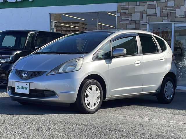 ホンダ フィット G 徳島県 2010(平22)年 6.7万km アラバスターシルバーメタリック 7型社外SDナビ　AVN119M/（ラジオ/CD/ワンセグ/iPod）/ETC/キセノンヘッドライト/純正フロアマット/ウィンドロック/レベライザー/純正14インチアルミホイール/電動格納ミラー/リモコンキー/取扱説明書/新車時保証書
