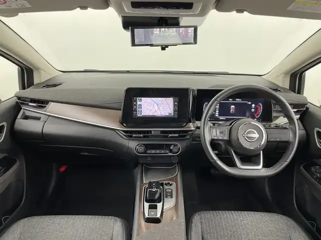 日産 オーラ G 愛知県 2022(令4)年 3万km ピュアホワイトパール / スーパーブラック 2トーン 禁煙車/純正7インチナビ/（CD/USB/Bluetooth/フルセグTV/SD)/全方位カメラ/衝突軽減ブレーキ/レーンキープアシスト/オートマチックハイビーム/コーナーセンサー/ブラインドスポットモニター/ハーフレザーシート/純正17インチアルミホイール/スマートキー/プッシュスタート/LEDヘッドライト/フロントフォグランプ/オートライト/フロアマット/横滑り防止装置/電動格納ミラー