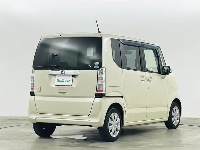 ホンダ Ｎ ＢＯＸ G 福島県 2017(平29)年 8.2万km プレミアムアイボリーP 社外ナビゲーション/・フルセグTV/CD/DVD/SD/・バックカメラ/両側スライドドア/プッシュスタート/・スマートキー/LEDヘッドライト/・ヘッドライトレベライザー/社外フロアマット/ドアバイザー/冬タイヤ4本積込み(社外アルミ)