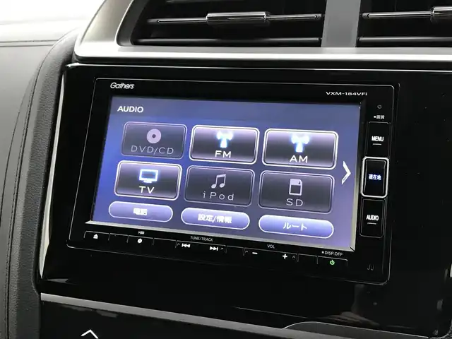 ホンダ フィット ハイブリット L ホンダセンシング 鳥取県 2018(平30)年 5.7万km プレミアムホワイトパールⅡ 純正ナビ/フルセグ/CD/DVD/BT/バックカメラ・ETC/ホンダセンシング/レーンキープアシスト/レーダークルーズコントロール/ハーフレザーシート/LEDヘットライト/フォグライト/ステアリングスイッチ/プッシュエンジンスタート/スマートキー/フロアマット/ドアバイザー