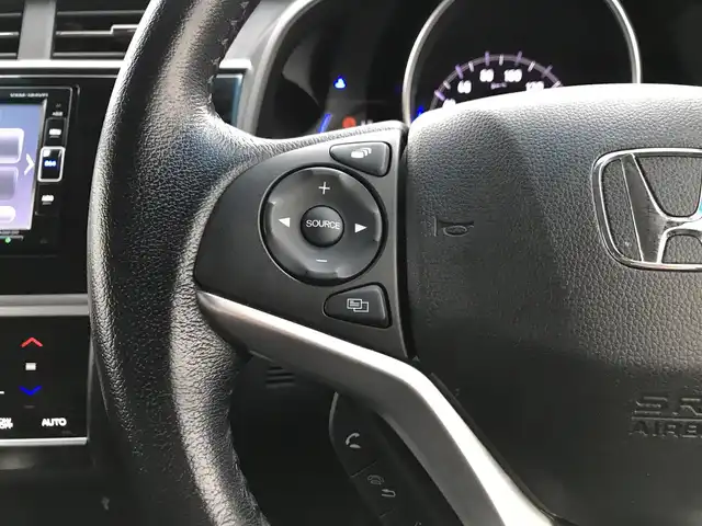 ホンダ フィット ハイブリット L ホンダセンシング 鳥取県 2018(平30)年 5.7万km プレミアムホワイトパールⅡ 純正ナビ/フルセグ/CD/DVD/BT/バックカメラ・ETC/ホンダセンシング/レーンキープアシスト/レーダークルーズコントロール/ハーフレザーシート/LEDヘットライト/フォグライト/ステアリングスイッチ/プッシュエンジンスタート/スマートキー/フロアマット/ドアバイザー