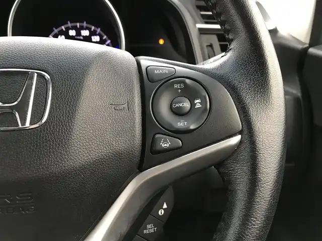 ホンダ フィット ハイブリット L ホンダセンシング 鳥取県 2018(平30)年 5.7万km プレミアムホワイトパールⅡ 純正ナビ/フルセグ/CD/DVD/BT/バックカメラ・ETC/ホンダセンシング/レーンキープアシスト/レーダークルーズコントロール/ハーフレザーシート/LEDヘットライト/フォグライト/ステアリングスイッチ/プッシュエンジンスタート/スマートキー/フロアマット/ドアバイザー