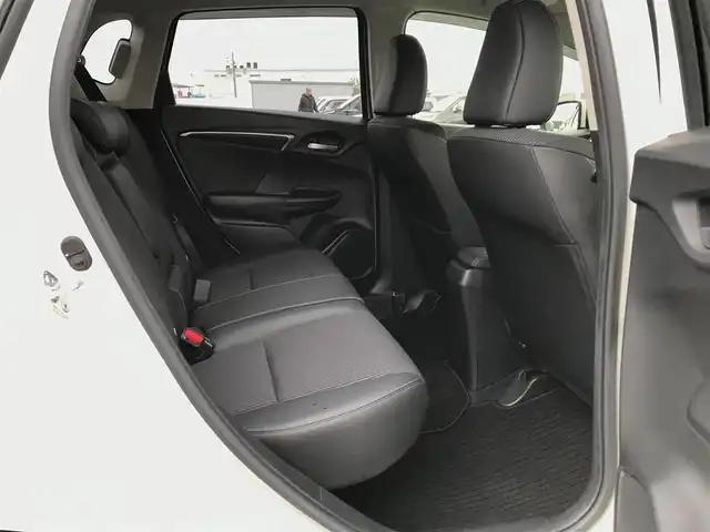 ホンダ フィット ハイブリット L ホンダセンシング 鳥取県 2018(平30)年 5.7万km プレミアムホワイトパールⅡ 純正ナビ/フルセグ/CD/DVD/BT/バックカメラ・ETC/ホンダセンシング/レーンキープアシスト/レーダークルーズコントロール/ハーフレザーシート/LEDヘットライト/フォグライト/ステアリングスイッチ/プッシュエンジンスタート/スマートキー/フロアマット/ドアバイザー