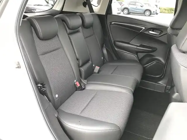 ホンダ フィット ハイブリット L ホンダセンシング 鳥取県 2018(平30)年 5.7万km プレミアムホワイトパールⅡ 純正ナビ/フルセグ/CD/DVD/BT/バックカメラ・ETC/ホンダセンシング/レーンキープアシスト/レーダークルーズコントロール/ハーフレザーシート/LEDヘットライト/フォグライト/ステアリングスイッチ/プッシュエンジンスタート/スマートキー/フロアマット/ドアバイザー