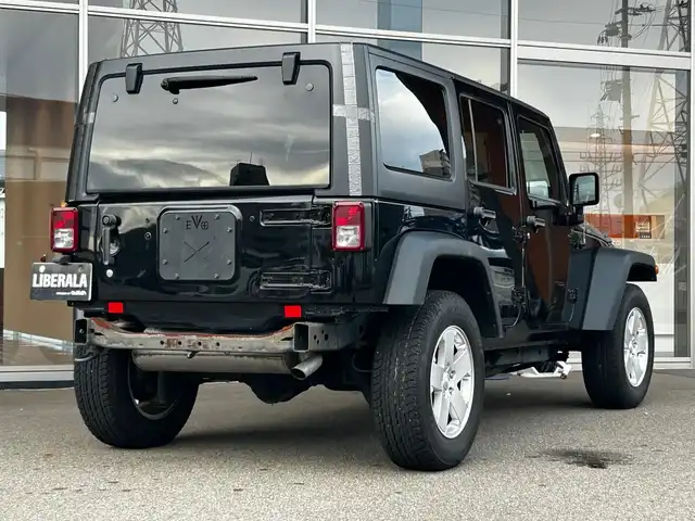 クライスラー・ジープ ジープ ラングラー アンリミテッド スポーツ 富山県 2017(平29)年 4.8万km 黒 ４WD/ワンオーナー/アルパイン9型ナビ/Bluetooth接続/AM/FMラジオ/フルセグTV/クルーズコントロール（追従なし）/ETC/前後ドラレコ/横滑り防止機能/ダウンヒルアシストコントロール/革巻きステアリング/純正パーツ積込み（Fバンパー/サイドステップ/Rバンパー）/ヘッドライトレベライザー/リモコンキー/純正AW/R6年記録簿