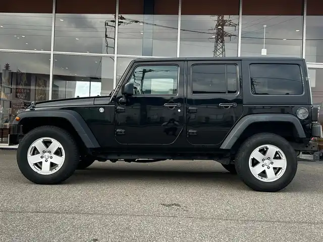 クライスラー・ジープ ジープ ラングラー アンリミテッド スポーツ 富山県 2017(平29)年 4.8万km 黒 ４WD/ワンオーナー/アルパイン9型ナビ/Bluetooth接続/AM/FMラジオ/フルセグTV/クルーズコントロール（追従なし）/ETC/前後ドラレコ/横滑り防止機能/ダウンヒルアシストコントロール/革巻きステアリング/純正パーツ積込み（Fバンパー/サイドステップ/Rバンパー）/ヘッドライトレベライザー/リモコンキー/純正AW/R6年記録簿