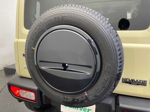 スズキ ジムニー ノマド FC 愛媛県 2025(令7)年 0.1千km アークティックホワイトパール 登録済未使用車／アダプティブクルーズコントロール／ステアリングスイッチ／ダウンヒルアシストコントロール／ＬＥＤヘッドライト／オートライト／オートマチックハイビーム／純正15インチアルミホイール