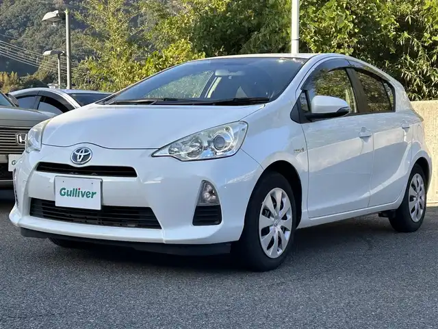 トヨタ アクア S 長崎県 2014(平26)年 16.5万km ライムホワイトパールクリスタルシャイン 純正ナビ/フルセグＴＶ/ＤＶＤ再生/ＥＴＣ/Bluetooth/バックカメラ/ステアリングスイッチ/電格ミラー/スマートキー/プッシュスタート/AAC