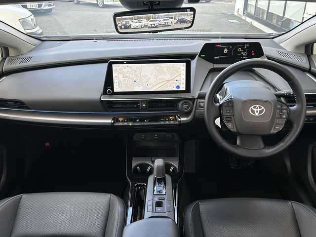 トヨタ プリウス Z 山形県 2024(令6)年 1.5万km プラチナホワイトパールマイカ 禁煙車/４WD/トヨタセーフティセンス/クルーズコントロール/ブラインドスポットモニター/レーンキープアシスト/横滑り防止装置/全方位カメラ/デジタルインナーミラー/前後コーナーセンサー/オートマチックハイビーム/純正ナビ/（Bluetooth/フルセグ/AM/FM/USB)/置くだけ充電/ステアリングスイッチ/ステアリングヒーター/レザーシート/D席パワーシート/前席シートヒーター・エアシート/スマートキー×２/ビルトインETC/純正フロアマット/電動格納ミラー/ドアバイザー/純正アルミホイール/LEDヘッドライト/フォグランプ