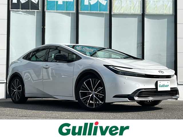 トヨタ プリウス Z 山形県 2024(令6)年 1.5万km プラチナホワイトパールマイカ 禁煙車/４WD/トヨタセーフティセンス/クルーズコントロール/ブラインドスポットモニター/レーンキープアシスト/横滑り防止装置/全方位カメラ/デジタルインナーミラー/前後コーナーセンサー/オートマチックハイビーム/純正ナビ/（Bluetooth/フルセグ/AM/FM/USB)/置くだけ充電/ステアリングスイッチ/ステアリングヒーター/レザーシート/D席パワーシート/前席シートヒーター・エアシート/スマートキー×２/ビルトインETC/純正フロアマット/電動格納ミラー/ドアバイザー/純正アルミホイール/LEDヘッドライト/フォグランプ