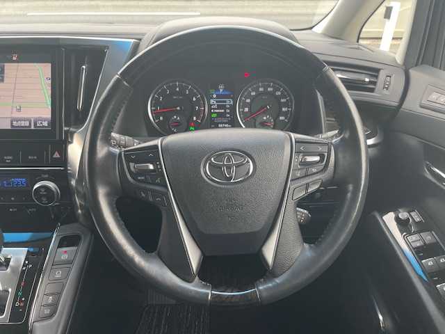 トヨタ ヴェルファイア Z Gエディション 三重県 2016(平28)年 6.7万km ホワイトパールクリスタルシャイン メーカーオプション/・レーダークルーズコントロール/・インテリジェントクリアランスソナー/・プリクラッシュセーフティシステム/1オーナー/純正11型フリップダウンモニター/純正10型SDナビ/フルセグTV/【CD/DVD/SD/Bluetooth】/バックカメラ/ビルトインETC/両側パワースライドドア/ハーフレザーシート/D/N席パワーシート/2列目エグゼクティブパワーシート/パワーバックドア/サンシェード/ステアリングヒーター/オートライト/LEDヘッドランプ/LEDフロントフォグランプ/235/50R18インチ純正AW/プッシュスタート/スマートキー/スペアキー/純正フロアマット