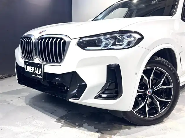 ＢＭＷ ＢＭＷ Ｘ３ 20d xDrive Mスポーツ 道央・札幌 2023(令5)年 6.4万km アルピンホワイトⅢ BMWライブ・コックピット・プロフェッショナル/・BMWカーブド・ディスプレイ/・12.3インチマルチ・ディスプレイ・メーターパネル/・14.9インチワイド・コントロール・ディスプレイ（タッチパネル機能付）/・ARビュー/・ナビゲーションシステム/・BMWインテリジェント・パーソナル・アシスタント/　（AI音声会話システム）/・スマートフォン・インテグレーション/アンビエント/１２V電源ソケット/インタラクション・バー/ラゲージエリアカバー/harman/kardonサウンド/3ゾーン・オートマッチク・エアコンディショナー（マイクロファイター付き）/・運転席＆助手席独立温度調節機能/・後席用独立温度調節機能/・後席用エア・アウトレット/・パーキング・ベンチレーション/ラジオ/地上デジタルTVチューナー/USBオーディオ・インターフェイス/Bluetoothインターフェイス/Mスポーツ・レザー・ステアリング・ホイール/Mアンソラジット・ルーフ・ランニング/照明付バニティ・ミラー