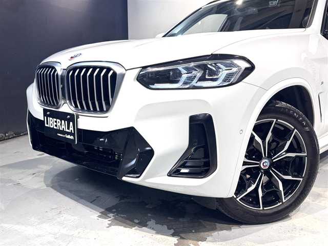ＢＭＷ ＢＭＷ Ｘ３ 20d xDrive Mスポーツ 道央・札幌 2023(令5)年 6.4万km アルピンホワイトⅢ BMWライブ・コックピット・プロフェッショナル/・BMWカーブド・ディスプレイ/・12.3インチマルチ・ディスプレイ・メーターパネル/・14.9インチワイド・コントロール・ディスプレイ（タッチパネル機能付）/・ARビュー/・ナビゲーションシステム/・BMWインテリジェント・パーソナル・アシスタント/　（AI音声会話システム）/・スマートフォン・インテグレーション/アンビエント/１２V電源ソケット/インタラクション・バー/ラゲージエリアカバー/harman/kardonサウンド/3ゾーン・オートマッチク・エアコンディショナー（マイクロファイター付き）/・運転席＆助手席独立温度調節機能/・後席用独立温度調節機能/・後席用エア・アウトレット/・パーキング・ベンチレーション/ラジオ/地上デジタルTVチューナー/USBオーディオ・インターフェイス/Bluetoothインターフェイス/Mスポーツ・レザー・ステアリング・ホイール/Mアンソラジット・ルーフ・ランニング/照明付バニティ・ミラー