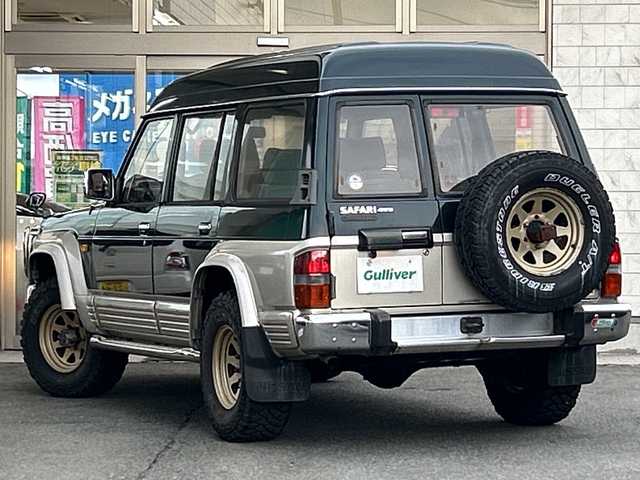 日産 サファリ エクストラV グランロード 岩手県 2024(令6)年 8.3万km 緑 ハイルーフ /社外オーディオ/ETC /冬タイヤ有 /エアコン /リアヒーター/社外グリルバンパーガード /フロントウインチ付 /社外ヘッドライト /電動角度調整ミラー /スペアキー /社外フロアマット /保証書 取説