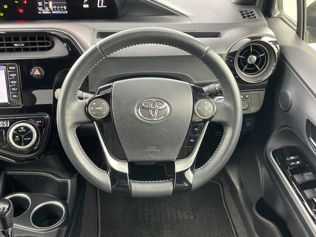 トヨタ アクア クロスオーバー グラム 愛知県 2019(令1)年 2.6万km ブラックマイカ 純正７インチSDナビ/（Bluetooth/ワンセグTV)/バックカメラ/ビルトインETC/トヨタセーフティセンス/前後クリアランスソナー/ドライブレコーダー前（DRT-H68A）/ハーフレザーシート/ステアリングスイッチ/ビルドインETC/LEDヘットライト/LEDフォグライト/純正16インチアルミホイール/プッシュエンジンスタート/スマートキー/保証書・取扱説明書